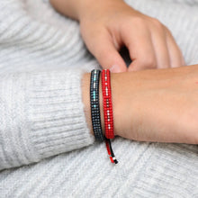 Matching Couples Morse Code Bracelets on a hand